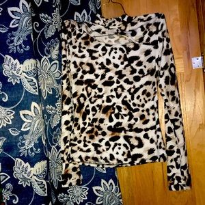 Woman’s cheetah print turtle neck long sleeve shirt